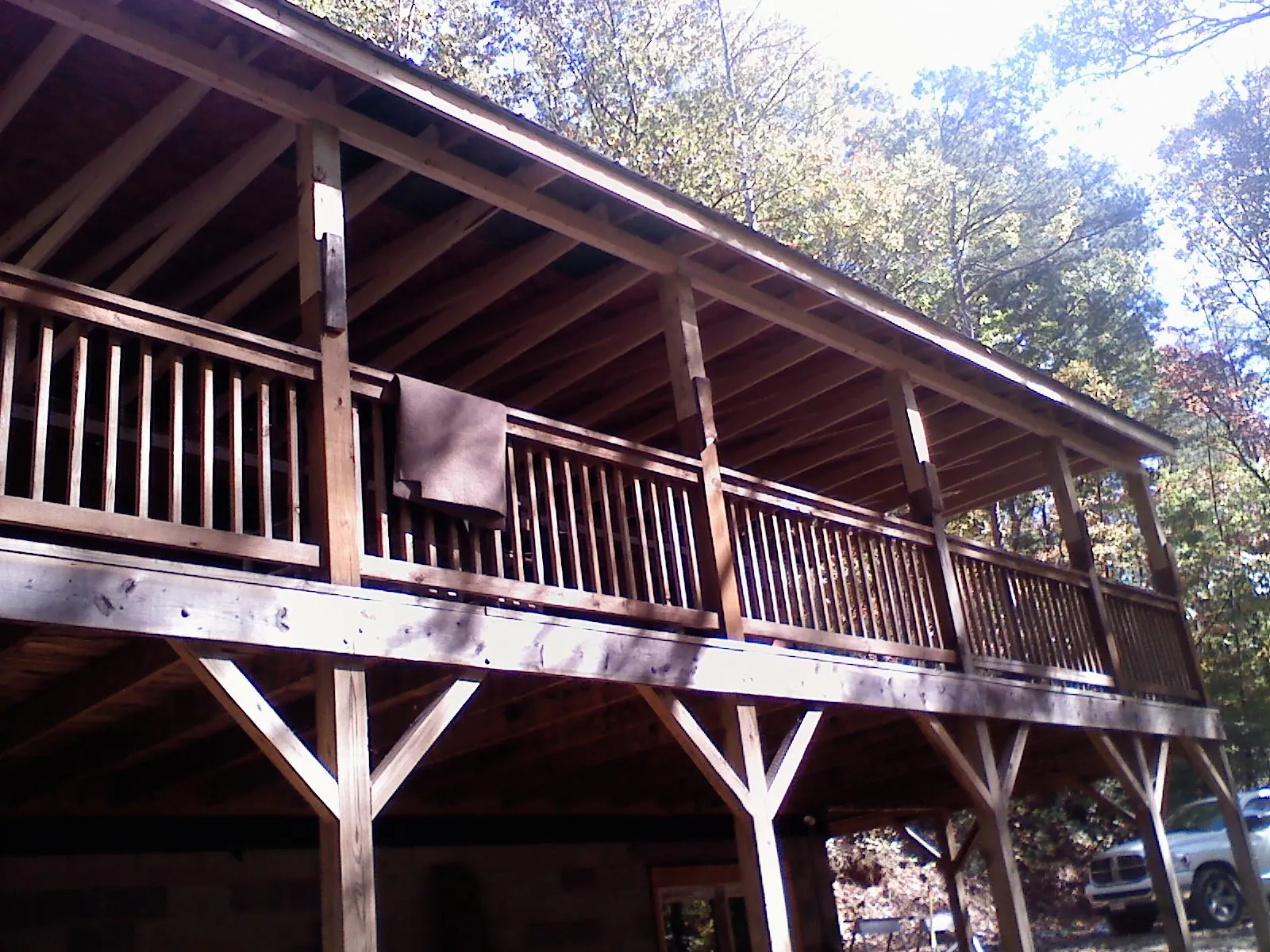 Timber framing under a new elevated porch and deck — Roof Leak Repair in Kasson by Roofing Brothers